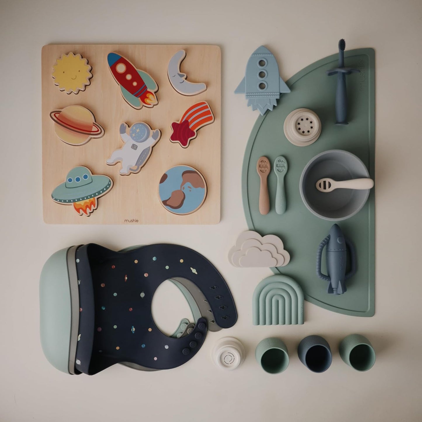 mushie Silicone Baby Bib | Adjustable Fit Waterproof Bibs (Planets)