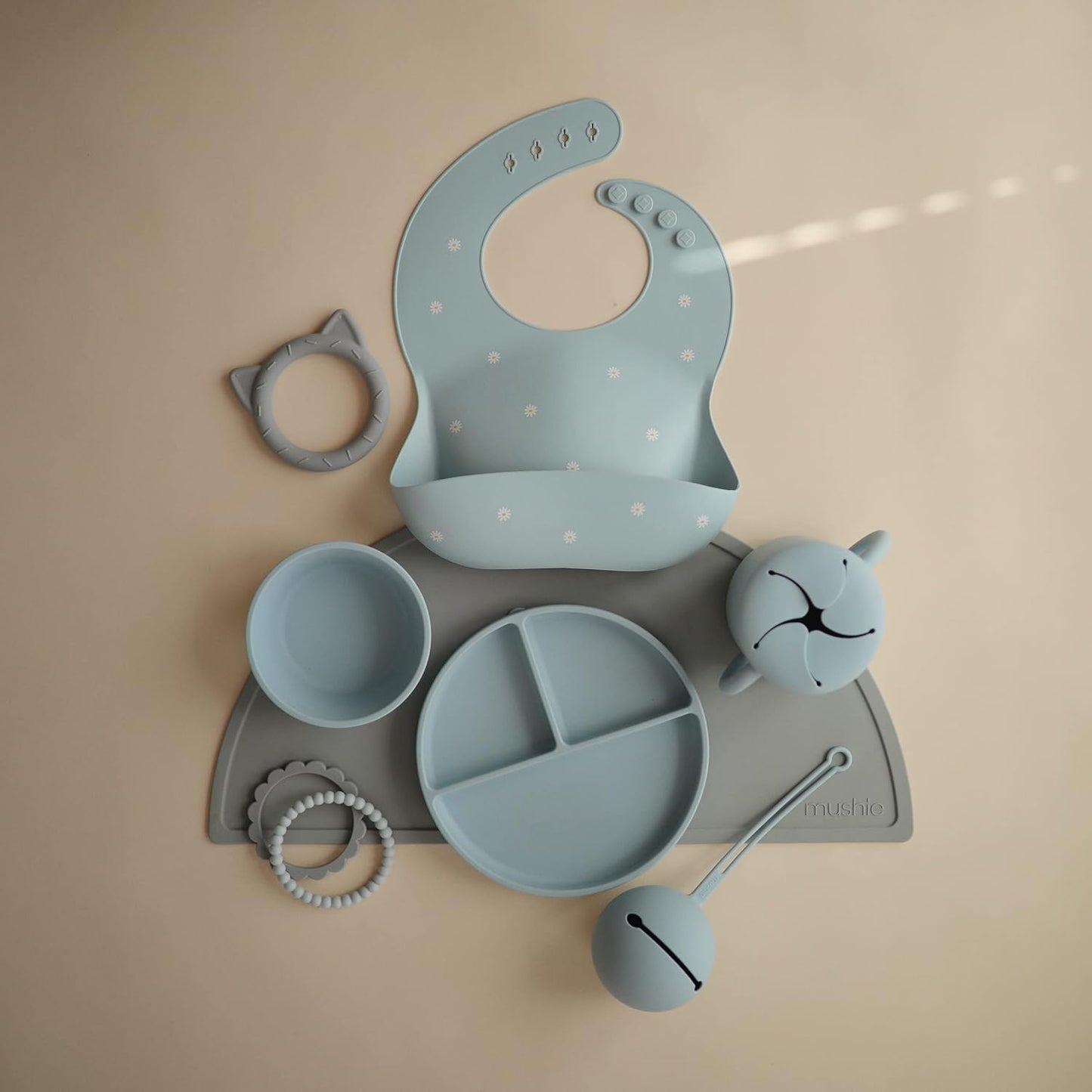 mushie Silicone Baby Bib | Adjustable Fit Waterproof Bibs (White Daisy)