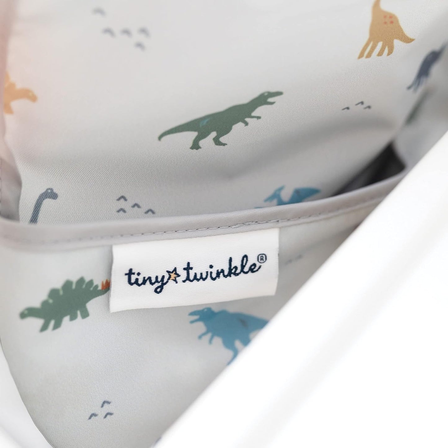 Tiny Twinkle Mess Proof Baby Bib - Waterproof & Lightweight Baby-Led Weaning Apron | 100% Recycled Polyester, Easy Clean & Machine Washable (Dinosaur, Small 6-24 Months)